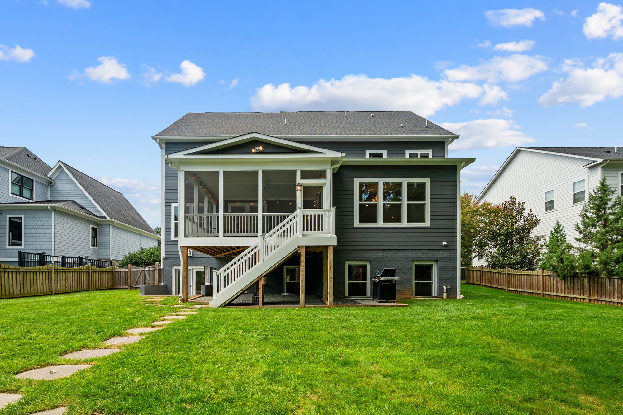 The screened-in porch and yard
